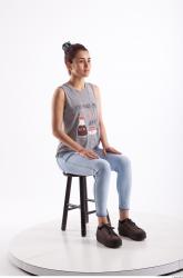 Sitting photo references of Molly blue jeans womna singlet